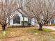 Charming home exterior showcasing well-maintained landscaping and attractive architectural details at 10519 Brawley Ln, Charlotte, NC 28215