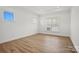 Bedroom featuring recessed lighting, wood floors, and large windows at 1074 Kinship Dr # 110, Lancaster, SC 29720