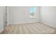 Bedroom with neutral carpet, a window, and a door at 1074 Kinship Dr # 110, Lancaster, SC 29720