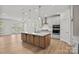 Bright and airy kitchen with a spacious island, stainless appliances, and natural light at 1074 Kinship Dr # 110, Lancaster, SC 29720