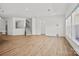 Spacious living room showcasing stairs, modern lighting, and an open layout perfect for Gathering gatherings at 1074 Kinship Dr # 110, Lancaster, SC 29720