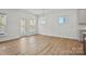 Bright open living area with stylish flooring and access to the backyard, ideal for entertaining at 1074 Kinship Dr # 110, Lancaster, SC 29720