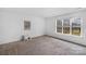 Bright bedroom with carpet and large window at 1124 Woodwinds Dr, Waxhaw, NC 28173