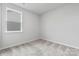 Relaxing bedroom with soft carpet, a window providing natural light, and a neutral color scheme at 1133 Hallman Branch Ln, Lincolnton, NC 28092