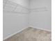 Empty walk-in closet features built-in wire shelving to maximize storage space at 1133 Hallman Branch Ln, Lincolnton, NC 28092