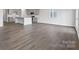 Open floor plan with hardwood floors, a view of the kitchen, and lots of natural light at 1133 Hallman Branch Ln, Lincolnton, NC 28092