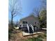 This home has a cozy back patio and a well-maintained backyard, perfect for outdoor activities at 1313 Eastway Dr, Charlotte, NC 28205