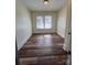 Bedroom features hardwood floors, neutral paint, and lots of natural light at 1313 Eastway Dr, Charlotte, NC 28205