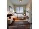 Bright bedroom features hardwood floors, neutral paint, and lots of natural light at 1313 Eastway Dr, Charlotte, NC 28205