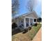 Charming single-story home with a welcoming front porch and well-maintained landscaping at 1313 Eastway Dr, Charlotte, NC 28205