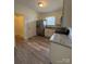 Kitchen featuring stainless steel appliances, granite countertops, and modern white cabinets at 1313 Eastway Dr, Charlotte, NC 28205