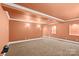Finished basement with neutral carpeting, recessed lighting, and ample space at 3853 Gordon St, Terrell, NC 28682