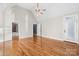 Spacious bedroom featuring hardwood floors, high ceilings, and natural light at 3853 Gordon St, Terrell, NC 28682