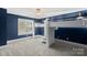 Stylish bedroom featuring unique white bunk beds and a serene blue accent wall at 3853 Gordon St, Terrell, NC 28682