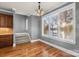 Dining area with staircase and large windows offering a scenic view of the lake at 3853 Gordon St, Terrell, NC 28682