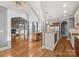 Open concept kitchen with adjacent living room and stone fireplace at 3853 Gordon St, Terrell, NC 28682