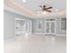 Large living area with tile flooring and French doors leading to the outside at 3853 Gordon St, Terrell, NC 28682