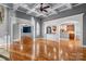 Spacious living room featuring hardwood floors and arched entrances to other rooms at 3853 Gordon St, Terrell, NC 28682