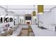Open-concept living room featuring a fireplace, large television, and adjacent kitchen and dining areas at 428 Dover Ave, Charlotte, NC 28209