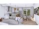 Bright open layout including the kitchen, dining and living spaces with modern decor at 428 Dover Ave, Charlotte, NC 28209