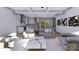 Spacious open-concept living room with modern decor, a view to the kitchen, and comfortable seating at 428 Dover Ave, Charlotte, NC 28209