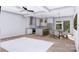 Open-concept living space with a kitchen island, modern lighting, and dining area at 428 Dover Ave, Charlotte, NC 28209