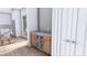 Stylish wet bar with a beverage cooler and sink near white closet doors at 428 Dover Ave, Charlotte, NC 28209