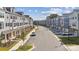 Aerial view of townhome community showcasing street and building exteriors at 7112 Brookview Ln, Sherrills Ford, NC 28673