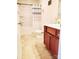 Modern bathroom includes a shower-tub combo, vanity and neutral tiling at 13112 Appolinaire Dr, Davidson, NC 28036
