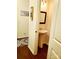 Charming half bath with pedestal sink, decorative mirror, and stylish decor at 13112 Appolinaire Dr, Davidson, NC 28036