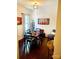 Bright dining room featuring dark wood floors and a stylish light fixture, great for Gathering gatherings at 13112 Appolinaire Dr, Davidson, NC 28036