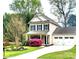 Charming two-story home featuring a well-manicured lawn and a two car garage, perfect for any Gathering at 13112 Appolinaire Dr, Davidson, NC 28036