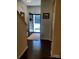 Inviting foyer with hardwood floors, showcasing a glimpse of the bright, airy interior at 13112 Appolinaire Dr, Davidson, NC 28036