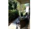 Cozy porch with comfortable seating, perfect for relaxing and enjoying the outdoor view of the surrounding greenery at 13112 Appolinaire Dr, Davidson, NC 28036