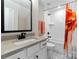 Clean bathroom with a bathtub and patterned floor at 15126 Sustar Farm Dr # 36, Matthews, NC 28105