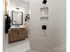 Modern bathroom with a walk-in shower and floating vanity at 15126 Sustar Farm Dr # 36, Matthews, NC 28105