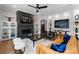 Spacious living room featuring a modern fireplace and stylish furnishings at 15126 Sustar Farm Dr # 36, Matthews, NC 28105