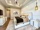 Spacious main bedroom with plush bedding and modern dresser at 15126 Sustar Farm Dr # 36, Matthews, NC 28105