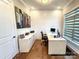 Home office with built-in desk and plenty of natural light at 15126 Sustar Farm Dr # 36, Matthews, NC 28105