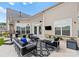 Outdoor patio area with seating and a grill at 15126 Sustar Farm Dr # 36, Matthews, NC 28105
