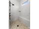 Spa-like shower with a built-in seat and hexagon tile floor at 15126 Sustar Farm Dr # 36, Matthews, NC 28105
