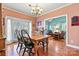 Bright dining room with hardwood floors and access to backyard at 20109 Norman Colony Rd, Cornelius, NC 28031