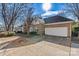 Brick home with attached garage and landscaped yard at 20109 Norman Colony Rd, Cornelius, NC 28031