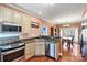 Galley kitchen with granite countertops and stainless steel appliances at 20109 Norman Colony Rd, Cornelius, NC 28031