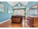 Main bedroom features high ceilings, hardwood floors and large windows at 20109 Norman Colony Rd, Cornelius, NC 28031