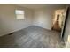 Well-lit bedroom with carpet and access to hallway at 3441 38Th Street Ne Dr, Hickory, NC 28601