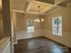 Spacious dining room featuring hardwood floors and coffered ceiling at 403 Imperial Way # 24, Albemarle, NC 28001