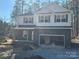 Two-story house with gray brick and dark gray shutters at 403 Imperial Way # 24, Albemarle, NC 28001