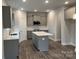 Modern kitchen with gray cabinets and a large island at 403 Imperial Way # 24, Albemarle, NC 28001