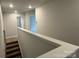 Upstairs hallway with access to bedrooms and stairs at 403 Imperial Way # 24, Albemarle, NC 28001